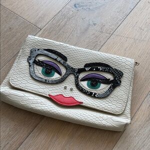 Stylish Cream Clutch with Unique Face Design